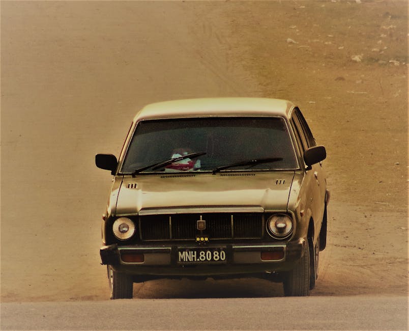 Classic yellow car representing vintage asset value